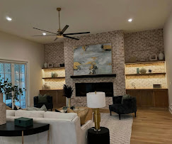 Living room with recessed lighting, fireplace feature wall, and ceiling fan installation